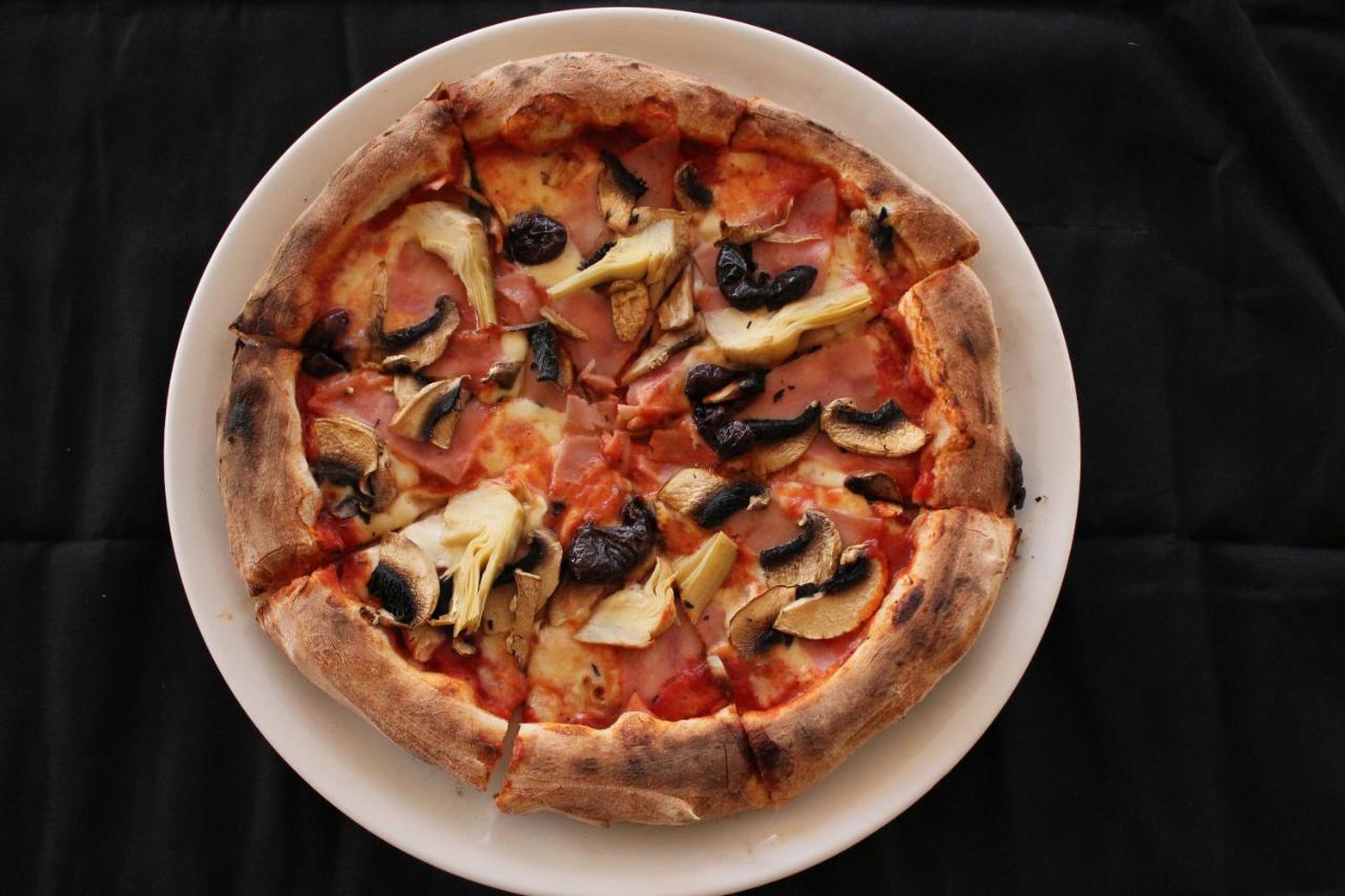 Lighthouse Golf & Spa Hotel Balchik Exterior foto Pizza